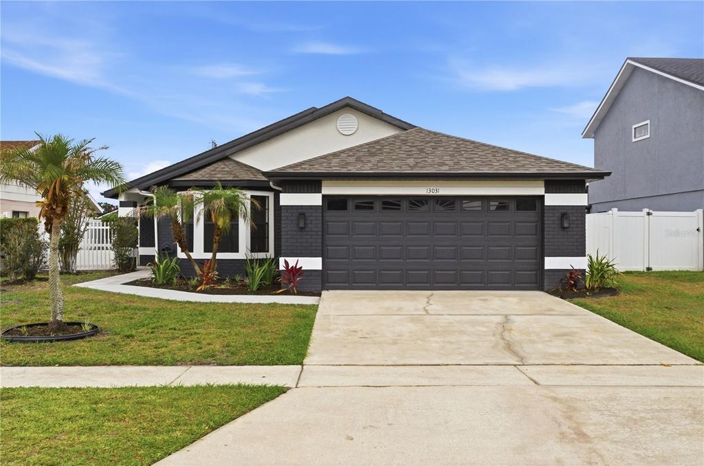 Photo of 13031 San Diego Woods Lane, Orlando, FL 32824 (MLS # O6407812)