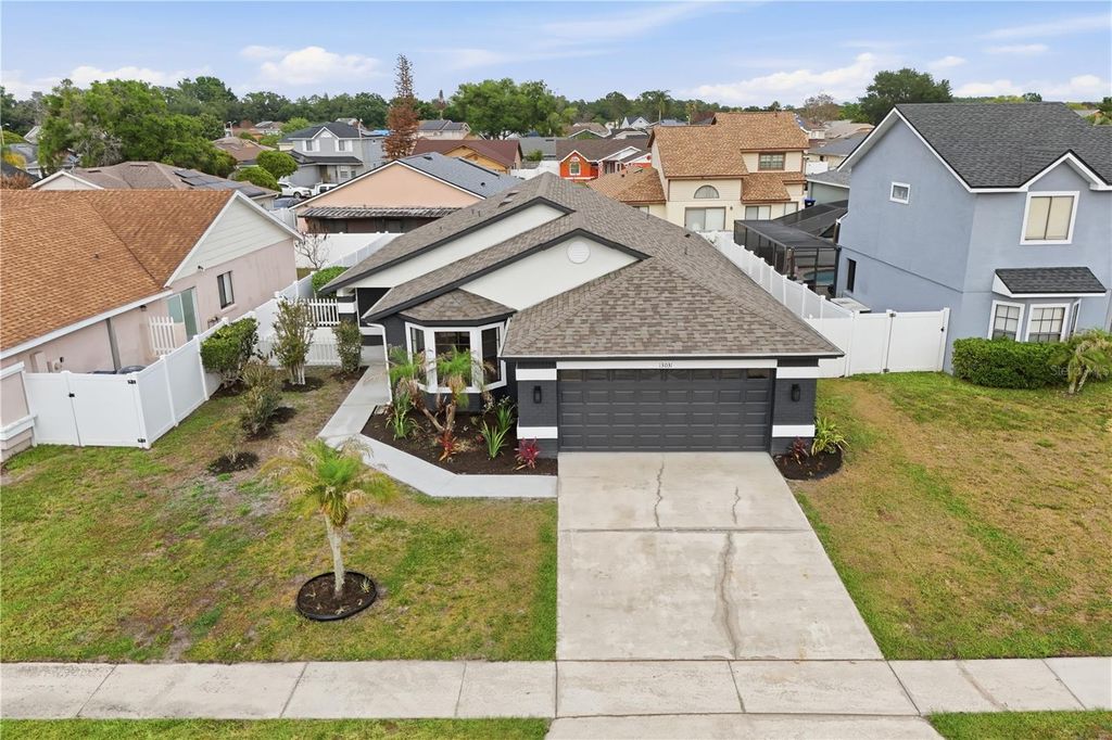 Photo of 13031 San Diego Woods Lane, Orlando, FL 32824 (MLS # O6407812)