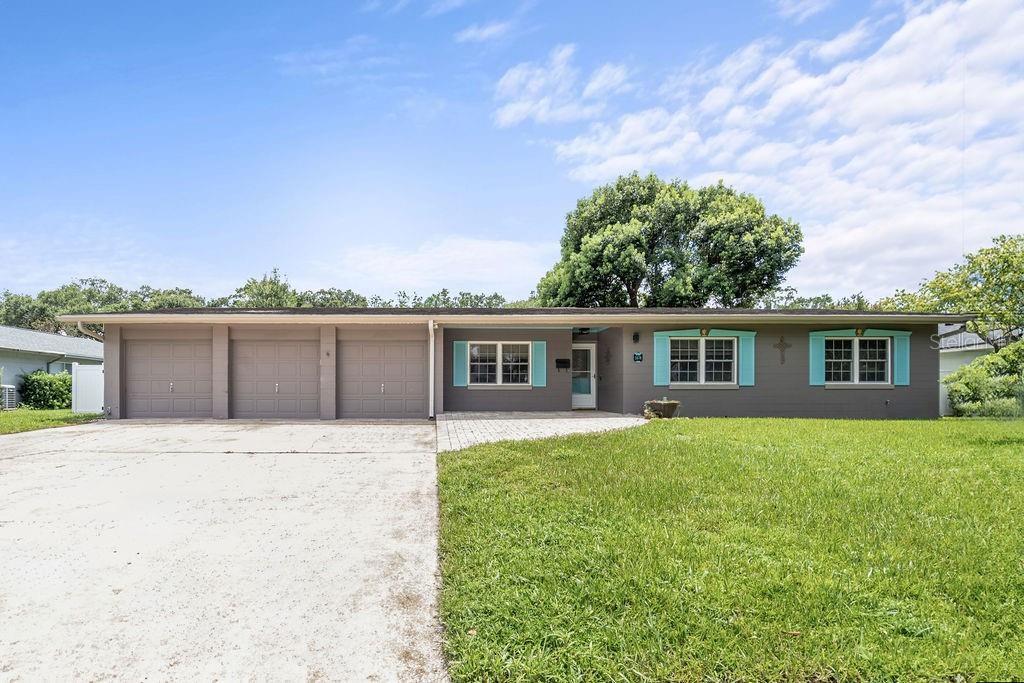 Expect to be impressed with this updated 3BR home in one of Winter Park’s well-
established neighborhoods. It starts with great curb appeal – meticulously manicured
front lawn, decorative paver stones surrounding the entryway and a 3-car garage! Step
inside to space originally designed as formal living and dining rooms – versatile to
arrange as you see fit. Walk back to the “WOW factor” – HUGE great room that’s open
to a contemporary kitchen – a great gathering space. Kitchen boasts granite counters,
island, separate breakfast bar, an abundance of cabinetry, walk-in pantry and
recessed/pendant lighting. Don’t forget to check out the work room tucked away in the
back, with its convenient built-in surfaces. Use for work, school, hobbies - whatever
suits your needs. Split bedroom plan with primary suite on one side – ideal for privacy.
Here you’ll enjoy two closets and an ensuite bath w/multiple shower heads. You will also
have access to a private, walled courtyard giving you a quiet spot for relaxation. Out
back, you’ll appreciate having a big, fenced yard (the lot is over ¼ acre), two handy
storage sheds, and a covered patio off the great room – perfect spot for enjoying a
BBQ. The home recently had a 4-point inspection and wind mitigation evaluation that
were both found satisfactory. Great overall location – no HOA, in an excellent school
district, 2 miles to Baldwin Park, SR 426, and SR 436 and 10 minutes to fabulous
downtown Winter Park. This home shows well and is move-in ready. Come see all that
makes it so special!