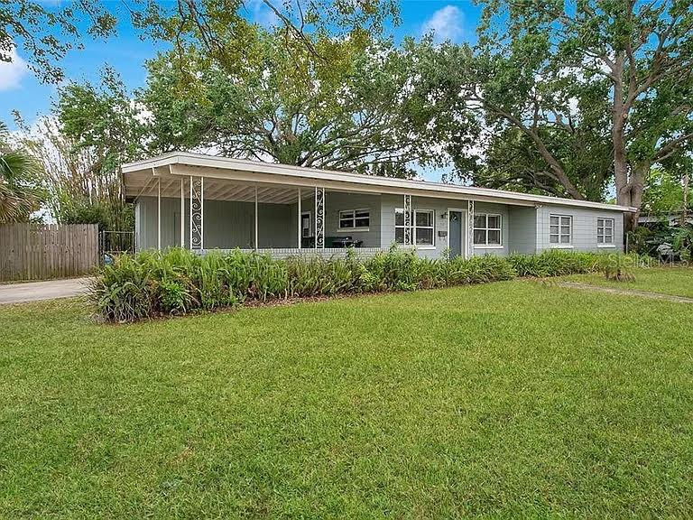 Beautiful mid-century modern home for rent! SIX MONTHS FREE LAWNCARE! 3-bedroom, 2-bath home in Fairview Shores with new kitchen appliances, 2023 A/C, and in-home washer/dryer. Enjoy a screened-in patio, spacious private backyard with board-on-board fence, and shed. Covered parking with carport enclosed storage. Primary and second bedroom have king sized beds for scale. Third bedroom has queen size Murphy bed which can be removed or left for tenant. Primary bathroom with oversized walk-in shower. Second bathroom with jacuzzi tub. Prime location near I-4, Publix in Winter Park Village, Walmart Neighborhood Market, Trotters Park, Orange County Public Library Branch, and multiple gyms, shops and restaurants. 10 minutes from downtown Orlando. 20 minutes from Universal Studios. 30 minutes to Disney. 10 minutes to downtown Winter Park. Call today to schedule a tour!!!!