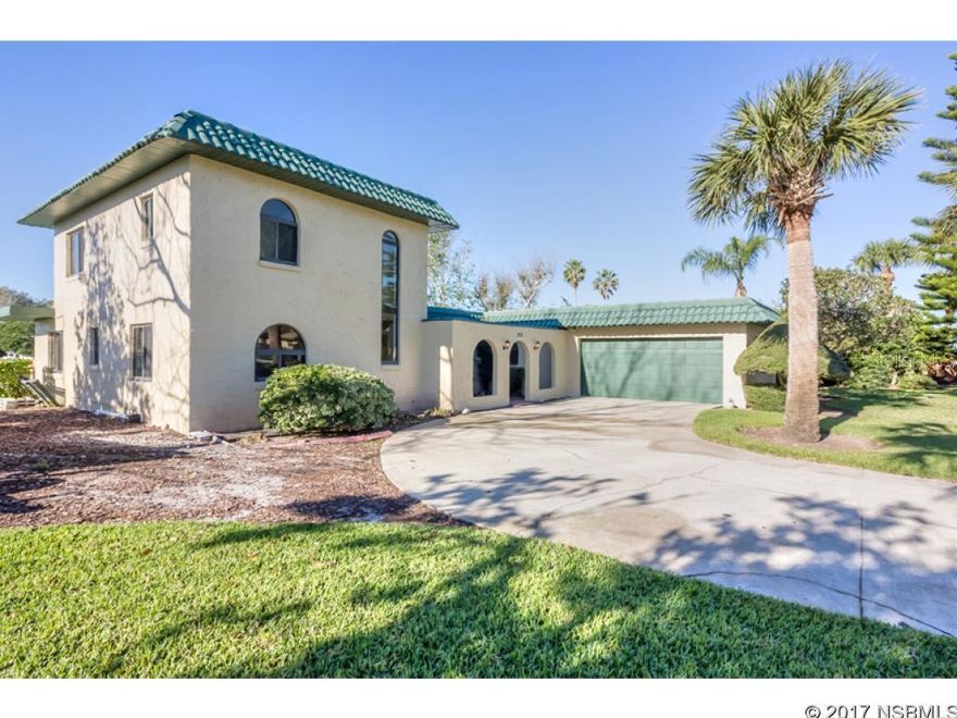 The Venezia community in New Smyrna Beach is the top choice for those who want deep water canals and fishing access to the inter-coastal. This exterior Mediterranean style home can be your âdream homeâ in a prestigious luxury home âfishingâ neighborhood. Modernize this over sized property, re-model this 2 story home or enjoy as it is. Lowest priced home in this area with âgreat bonesâ & flat roof, surviving 5 hurricanes with NO damage. Dock and seawall sports two remote controlled 2 small craft boat lifts. Enjoy top of the line full house generator and never be without power (10K bonus). Priced accordingly, house NOT neglected, the owner decided not to renovate allowing the new owners the option of...  making it their own. Open kitchen family room, separate living room, upstairs single bedroom & bath, two bedrooms downstairs, two downstairs baths, screen porch, hurricane windows and sliders (36k upgrade), 2.5 car garage with side work room with AC, plenty of space to park an RV/boat trailers on the side of the house. This neighborhood is transitioning with the emergence of re-modeled homes. Seller says bring all offers, wants it gone and fast! All offers will be considered.  All information is intended to be accurate but is not guaranteed. ;Water: City