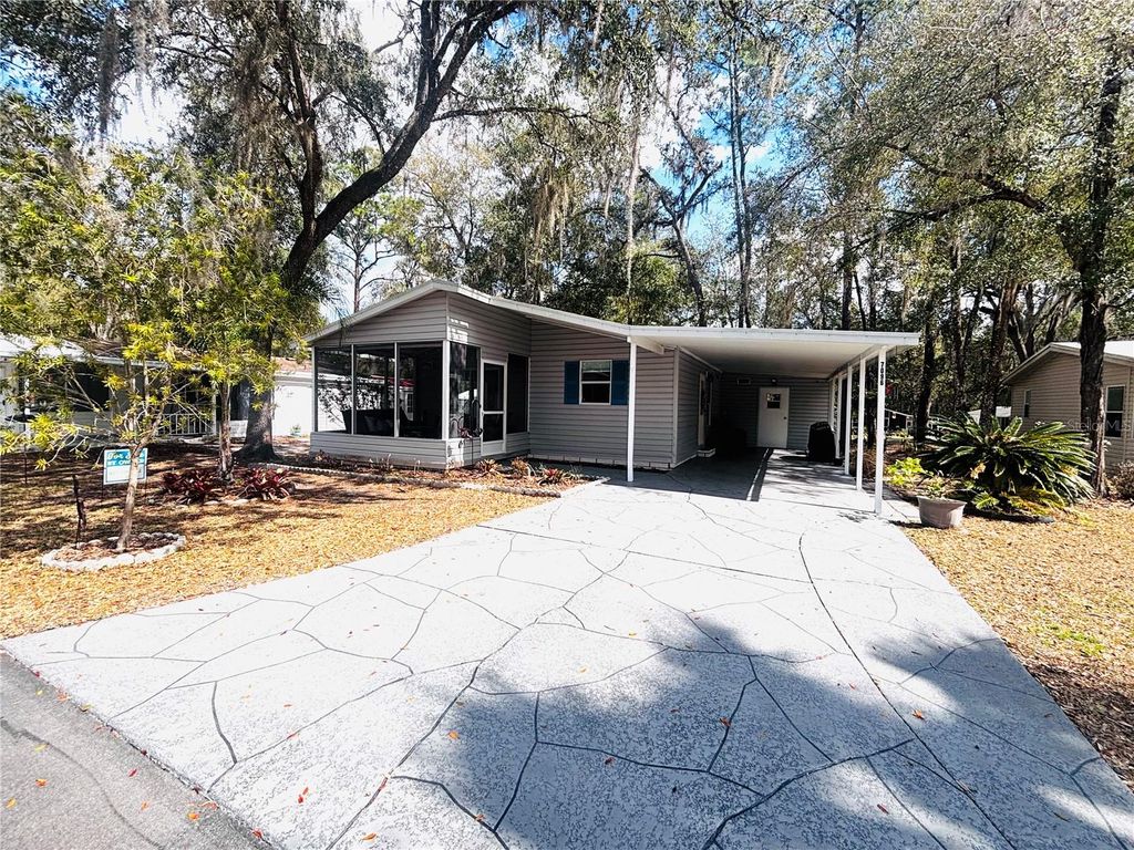 Photo of 7096 Spanish Moss Lane, Brooksville, FL 34601 (MLS # TB8478730)