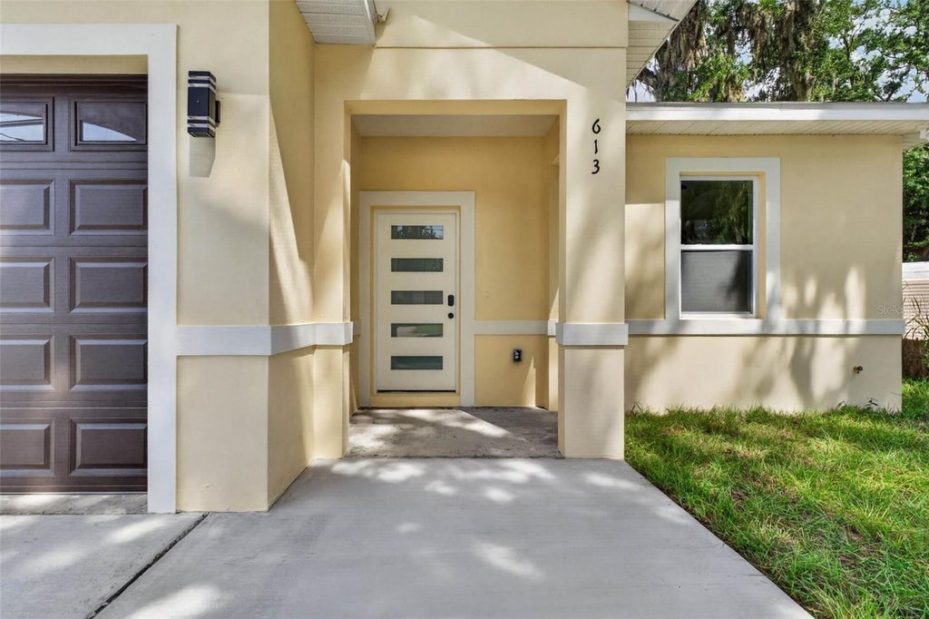 Photo of 613 W Valencia Street, Lakeland, FL 33805 (MLS # TB8552711)