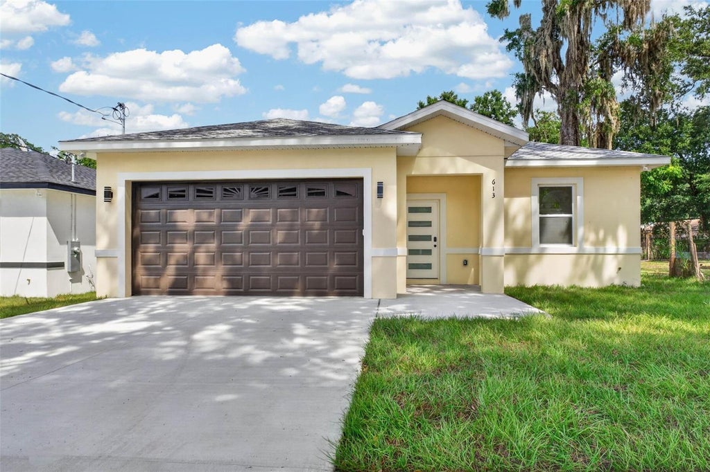 Photo of 613 W Valencia Street, Lakeland, FL 33805 (MLS # TB8552711)