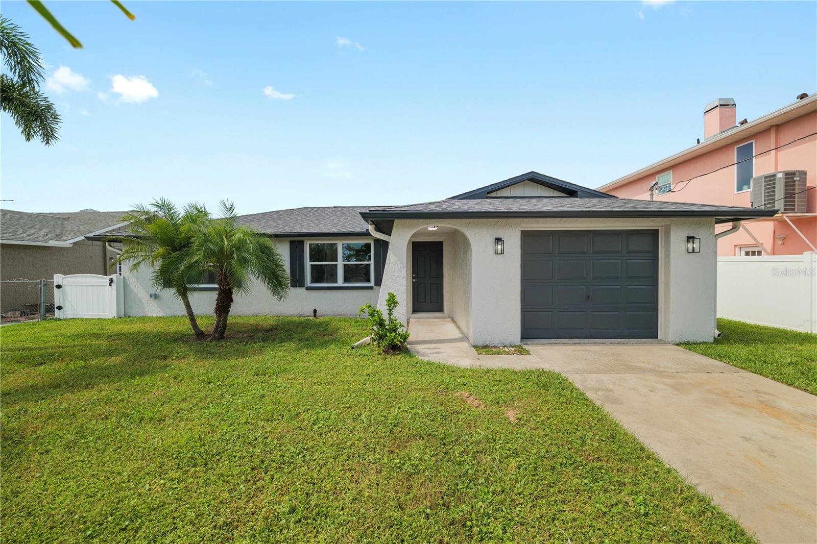 Completely Renovated Waterfront Beauty with Direct Gulf Access!
This stunning home has been fully transformed from top to bottom! There's nothing left to do but move-in and enjoy! Step inside to discover brand-new hurricane-impact windows and doors, a new roof, and a 2-year-old HVAC system for year-round comfort.
Fresh insulation meets current energy codes, ensuring efficiency and peace of mind. Every inch shines with new flooring throughout, fresh interior and exterior paint, upgraded trim, and new interior doors.
The gourmet kitchen is a Chef's dream, featuring premium finishes and modern cabinetry. The newly renovated bathrooms showcase stylish tile, updated fixtures, and contemporary vanities. The electrical system has been upgraded to current code, complete with new lighting throughout. A new tankless water heater rounds out the impressive list of upgrades.
Out back, relax on the spacious lanai while enjoying serene water views. The deep-water canal offers direct access to the Gulf of America! perfect for boaters and water sports enthusiasts alike.