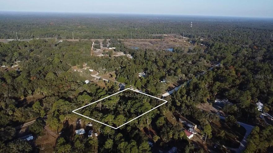 This property includes parcel number 1300800000 making this just over 2 acres. 
Welcome to your rare opportunity: just over 2 acres of land in Inglis, Florida, combining a 1.16-acre parcel with an additional 0.98-acre lot. This generous space offers the perfect canvas to build a custom home, establish a homestead, or create a private retreat along Florida’s beautiful Nature Coast. Located in the charming town of Inglis, part of Levy County, this property is nestled near peaceful waterways, abundant wildlife, and a community that embodies the spirit of "Old Florida." Inglis is just about five miles from the Gulf of Mexico, giving you both serene inland surroundings and access to costal recreation,