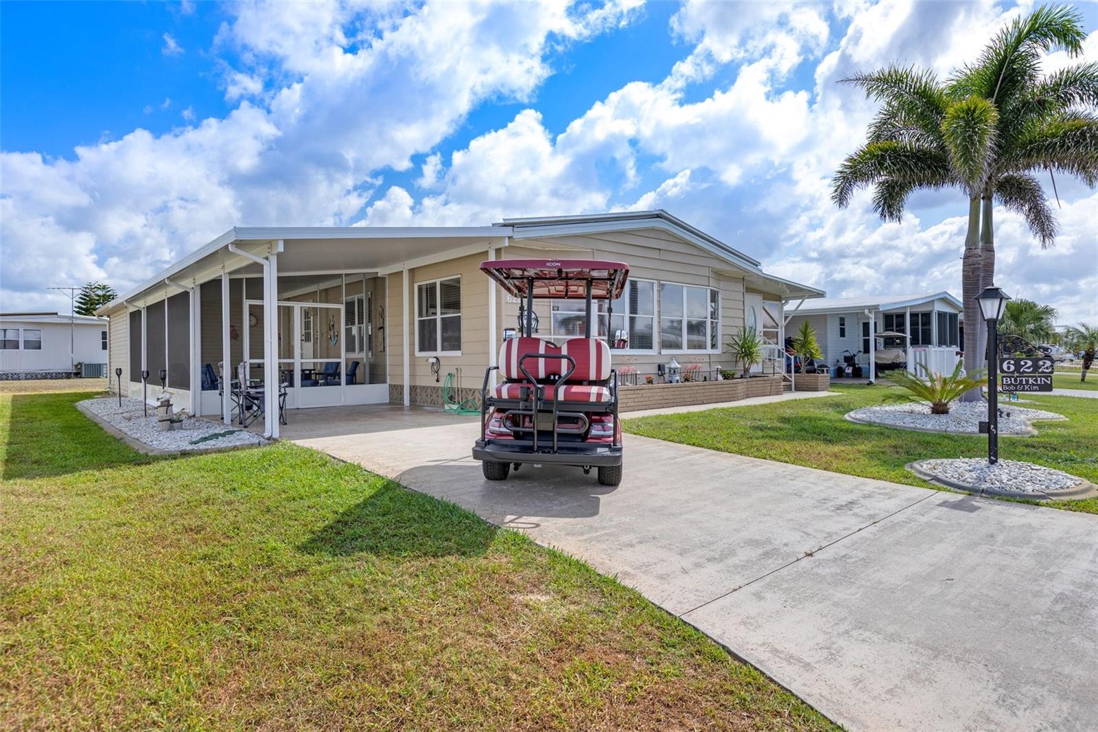 Immerse yourself in the enchanting Florida dream lifestyle with this delightful home, perfectly situated on a serene street within a vibrant 55+ community. Upon entering you'll be greeted by an airy open layout that seamlessly combines the spacious kitchen, dining, and living areas, making it an entertainer's paradise. The kitchen boasts an impressive array of cabinets and a cozy built-in eating space, ideal for casual meals and gatherings. The living room is flooded with natural light from a stunning wall of windows, creating a warm and inviting atmosphere. Step into the Florida room, an additional versatile space, perfect for entertaining or unwinding, which can even serve a a third sleeping area for guests. Retreat to your serene and spacious primary bedroom, featuring double closets and a luxuriously updated ensuite bath complete with an oversized walk-in shower and a convenient built-in bench. Your guests will feel right at home in the charming guest bedroom, complemented by a beautifully updated bathroom. This residence truly embodies the essence of Florida Living. Recent updates include a newer water heather, modern appliances, and a new A/C system in 2023. Plus, enjoy the convenience of the included 2021 Icon Golf Cart, equipped with an automatic battery watering system and newer tires. Don't miss the opportunity to make this your dream home! La Casa boasts 974 homes nestled among a variety of native trees with spacious common grounds surrounding our eight lakes. Our lots average a generous 60' by 80'. Located between Sarasota and Fort Myers, La Casa offers the ultimate lifestyle on Florida’s Gulf Coast. It is convenient for shopping, sightseeing, golfing, fishing, and boating, as well as all the culture and elegance the Southwest Florida area is noted for. Residents and visitors enjoy the warmth of Southwest Florida winters in a relaxed and unhurried environment far removed from the hustle of Florida’s east coast. You’ll be surrounded by mature lush landscaping which demonstrates the utmost level of care our property receives from residents and management. Our two pools have adjacent hot tubs which are ideal for soaking muscles that are tired from golfing or tennis. Wireless Internet (Wi-Fi) is available at the Clubhouse, Activity Building, and Recreation Hall area where our pools & spas are located, so you can catch some rays while you catch up on your email! Sound enticing? La Casa is a friendly, family community. You will be away from the hustle and bustle except when you want to be part of it. Come for a visit to this self-contained oasis and see for yourself why La Casa is the ultimate destination for both snowbirds and year-round residents!