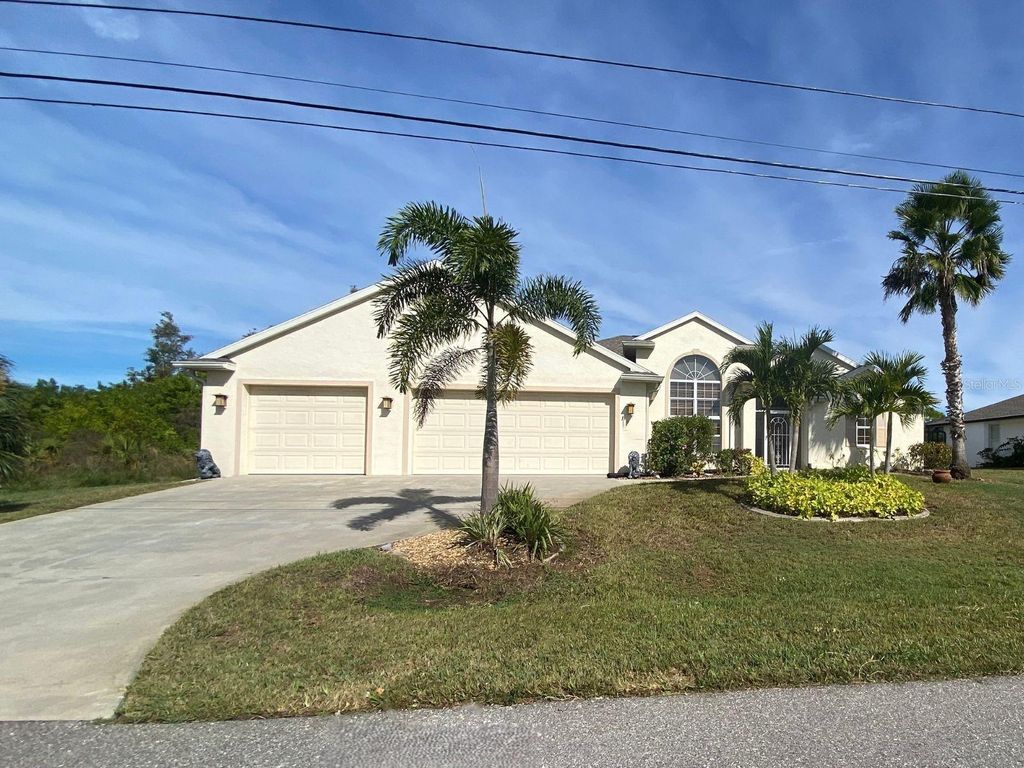 Photo of 15144 Lakeland Circle, Port Charlotte, FL 33981 (MLS # D6144270)
