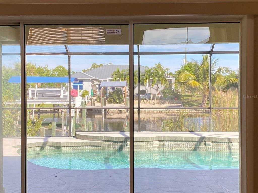 Photo of 15144 Lakeland Circle, Port Charlotte, FL 33981 (MLS # D6144270)