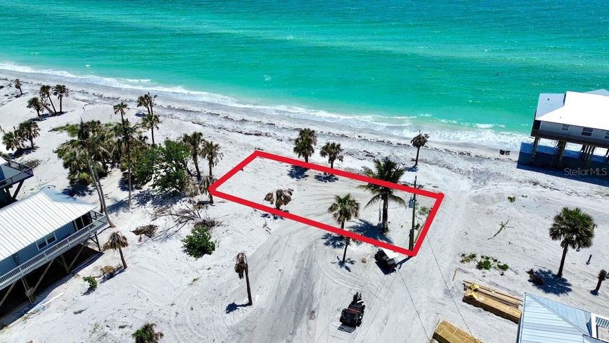 This vacant lot is on Little Gasparilla Island, a bridgeless barrier island that is accessible by private boat or water taxi only. The lot is third back from the gulf. It previously had a lovely beach cottage on it, but that was sadly washed away by hurricanes Helene and Milton. The septic tank is still on the property, no confirmation if it is reusable or not, and the water meter should still be there, but both are buried under the sand that washed in. This is a lovely lot with beautiful gulf views. The county GIS website aerial photo shows where the home used to sit on the property. The photo with the red lines is an approximate idea of where the lot lines are located. The home to the west of the lot was also washed away. There is a community dock for your boat, dock association dues are $250 a year. There are no restaurants, stores or shops on Little Gasparilla Island, just 3 1/2 miles of beautiful beach to enjoy, great fishing in the surrounding waters, and plenty of quiet tranquilly to help you relax and unwind. Check back soon for more photos of the lot.