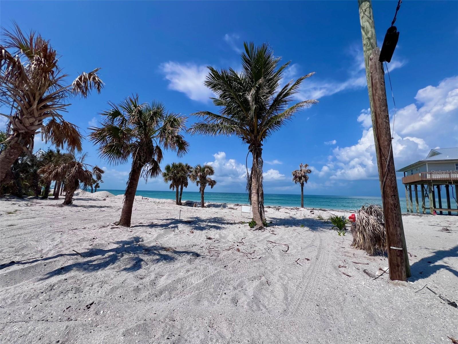 This vacant lot is on Little Gasparilla Island, a bridgeless barrier island that is accessible by private boat or water taxi only. The lot is third back from the gulf. It previously had a lovely beach cottage on it, but that was sadly washed away by hurricanes Helene and Milton. The septic tank is still on the property, no confirmation if it is reusable or not, and the water meter should still be there, but both are buried under the sand that washed in. This is a lovely lot with beautiful gulf views. The county GIS website aerial photo shows where the home used to sit on the property. The home to the west of the lot was also washed away. There is a community dock for your boat, dock association dues are $250 a year. There are no restaurants, stores or shops on Little Gasparilla Island, just 3 1/2 miles of beautiful beach to enjoy, great fishing in the surrounding waters, and plenty of quiet tranquilly to help you relax and unwind. Check back soon for more photos of the lot.