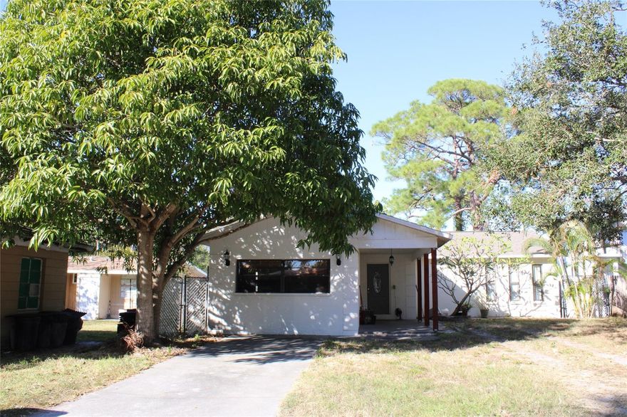 THIS IS THE MOST DESIRABLE PROPERTY TO ALL BUYERS WHO HAVE A VISION TO BUILD AND ADU (SUBJECT TO APPROVAL OF PINELLAS COUNTY) IN BACK YARD AND/OR TO ALL BUYERS WHO LOVE TO GROW FRUIT TREES AND VEGETABLES. BEING LOCATED IN UNINCORPORATED ALLOWS HOMEOWNER(S) TO LEASE TO SHORT TERM RENTERS (AIRBNB OR VRBO). HAVING A VAULTED CEILING AND 4 SIZABLE BEDROOMS WITH 2 FULL BATHROOMS MAKES THE HOUSE IS PERFECTLY SUITED FOR AIRBNB OR A GROWING FAMILY. IT IS HARD TO BELIEVE AND TO FIND A HOUSE IN THE HEART OF PINELLAS COUNTY WIH LOTS OF POTENTIAL WITH NO FLOOD INSURANCE NEEDED AND NO HOA REQUIRED!! SEEING IS BELIEVING. HURRY TO SCHEDULE A PRIVATE SHOWING TODAY BEFORE IT IS SOLD!!