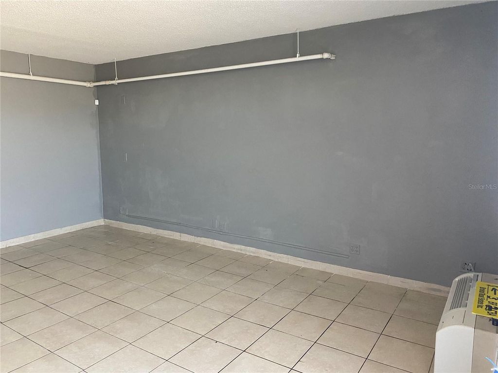 Photo of 8421 S Orange Blossom Trail #220, Orlando, FL 32809 (MLS # O6369076)