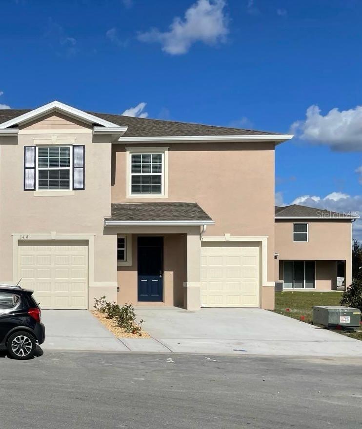 Beautiful 3-bedroom, 2.5-bath townhouse built in 2022, located in the highly sought-after Atria at Ridgewood Lakes community. This home features a bright and open floor plan, block and stucco construction, ceramic tile in main areas, and carpet in bedrooms. Enjoy a modern kitchen with quality finishes, spacious living areas, and a private outdoor space. The community offers resort-style amenities including a pool, clubhouse, and walking trails. Conveniently located near shopping, dining, golf, and major highways, with easy access to Orlando’s attractions.