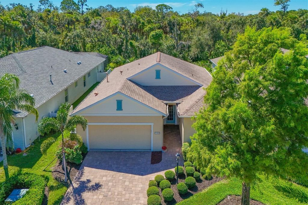 Photo of 4826 Lake Breeze Terrace, Sarasota, FL 34243 (MLS # A4665960)