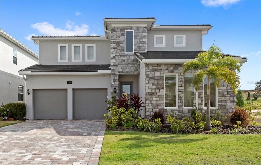 *$40,000 SPORTS MEMBERSHIP DEPOSIT INCLUDED (PAID FOR BY THE SELLER) AS APART OF THIS DESIGNER SHOWCASE ON THE BELLA COLLINA GOLF COURSE!* Welcome to 16124 Volterra Point, a beautifully crafted Captiva model by Dream Finders Homes, located in the exclusive, guard-gated community of Bella Collina. This residence offers just under 3,000 square feet of thoughtfully designed living space with 5 bedrooms and 4 bathrooms, including two full primary suites—ideal for multigenerational living or hosting guests. Set on a premium golf course front homesite, the home offers incredible views of the fairway and natural beauty that surrounds this luxury community. Inside of the home, you will be welcomed by soaring ceilings and you'll find stunning features such as luxury vinyl plank flooring, modern wire stair railing, and wood treads on the stairs. The gourmet kitchen is the heart of the home, featuring crisp white cabinetry, quartz countertops, stainless steel appliances, and a gas cooktop. The kitchen opens to the gathering room and the dining room. A spacious covered lanai is just outside of the large sliding glass door and is pre-plumbed for an outdoor kitchen and gas grill. The downstairs primary bedroom has 3 large windows letting in a great amount of natural light. The primary en-suite features a large vanity with dual sinks, an over-sized walk-in closet and a large shower with tile finishes extended to the ceiling. The second bedroom downstairs is located on the opposite side of the home, and is situated next to another full bathroom, making it a great downstairs guest suite, or functional home office. Upstairs, a generous loft offers flexible space for a playroom, media room or secondary family room. The second primary suite upstairs has views overlooking the golf course, and a spacious en-suite with a large shower. The laundry room is conveniently located on the second floor. Upstairs there are 2 additional bedrooms and the remaining guest bathroom, which is finished with white cabinetry and white quartz countertops. Living in Bella Collina means enjoying a resort-style lifestyle with world-class amenities, including a championship golf course, a 75,000-square-foot Tuscan-inspired clubhouse, full-service spa and salon, fitness center, resort pool, tennis, pickleball, fine dining, and a full calendar of social events.
With the $40,000 sports membership initiation fee covered by the seller, this is an incredible opportunity to own an incredible home in one of Central Florida’s most sought after communities. Bella Collina is located conveniently off of the turnpike giving easy access to Winter Garden, Windermere, the upcoming Hills of Minneola project, Walt Disney World, MCO airport and downtown Orlando. Also located only minutes to the coveted Montverde Academy. Schedule your private showing today.