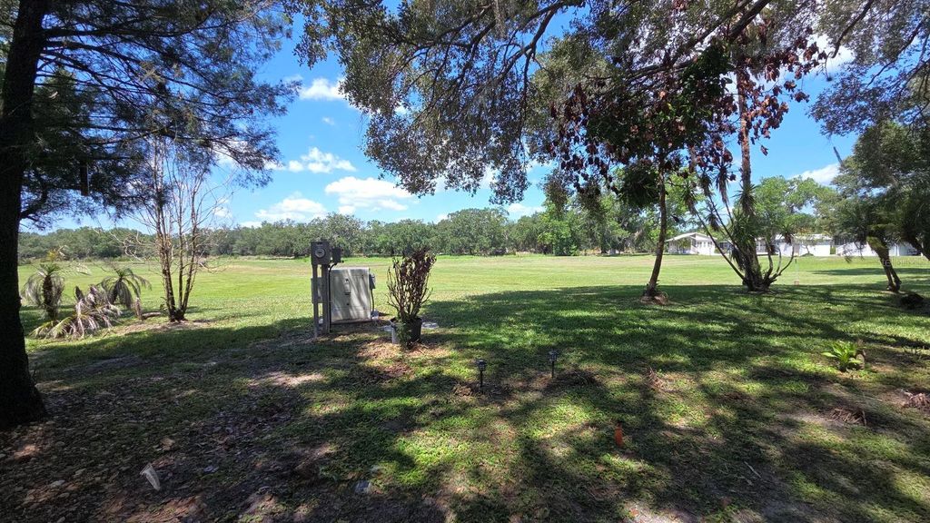 Photo of 161 Horseshoe Bend, River Ranch, FL 33867 (MLS # TB8494922)