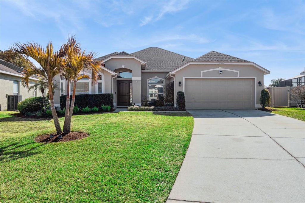 Photo of 12656 Waterhaven Circle, Orlando, FL 32828 (MLS # O6382884)