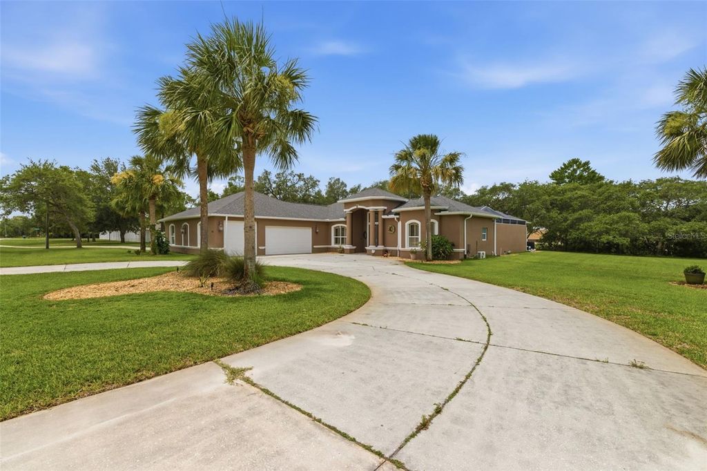 Photo of 11145 Mountain Mockingbird Rd, Weeki Wachee, FL 34614 (MLS # TB8514957)