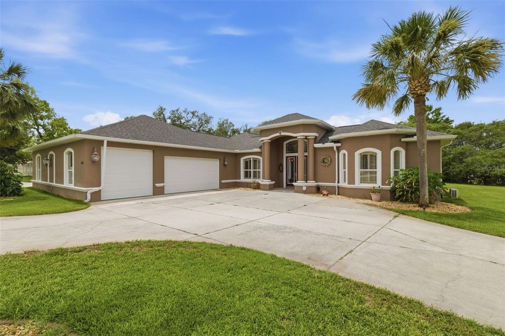 Photo of 11145 Mountain Mockingbird Rd, Weeki Wachee, FL 34614 (MLS # TB8514957)