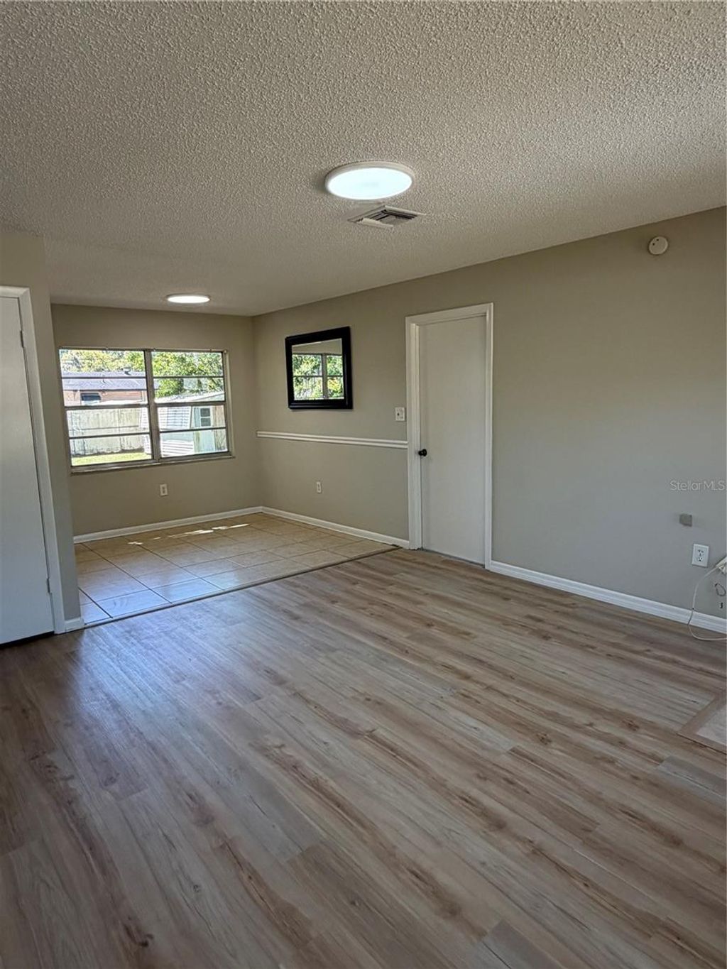 Photo of 709 Lewis Street, Fruitland Park, FL 34731 (MLS # O6392602)