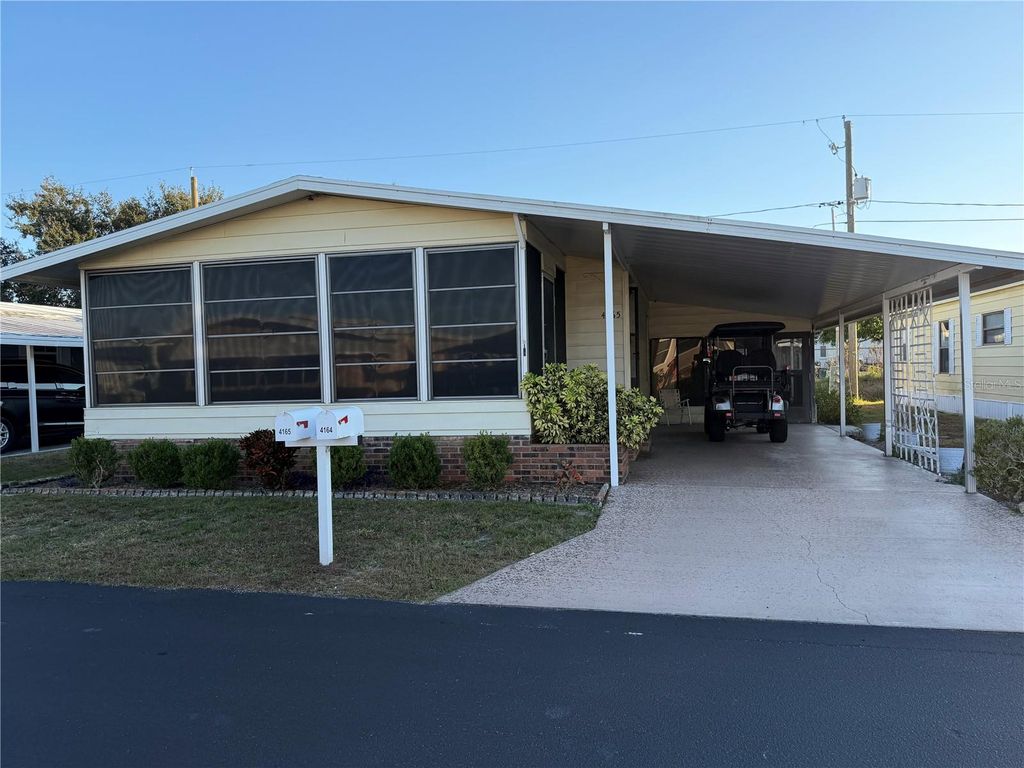 Photo of 4165 Rolling Oaks Drive, Winter Haven, FL 33880 (MLS # B4902127)