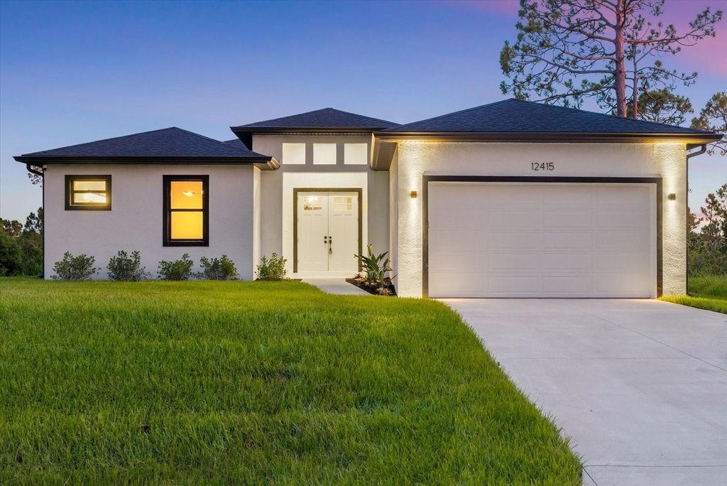 Photo of 12415 Mellon Avenue, Port Charlotte, FL 33953 (MLS # A4661121)