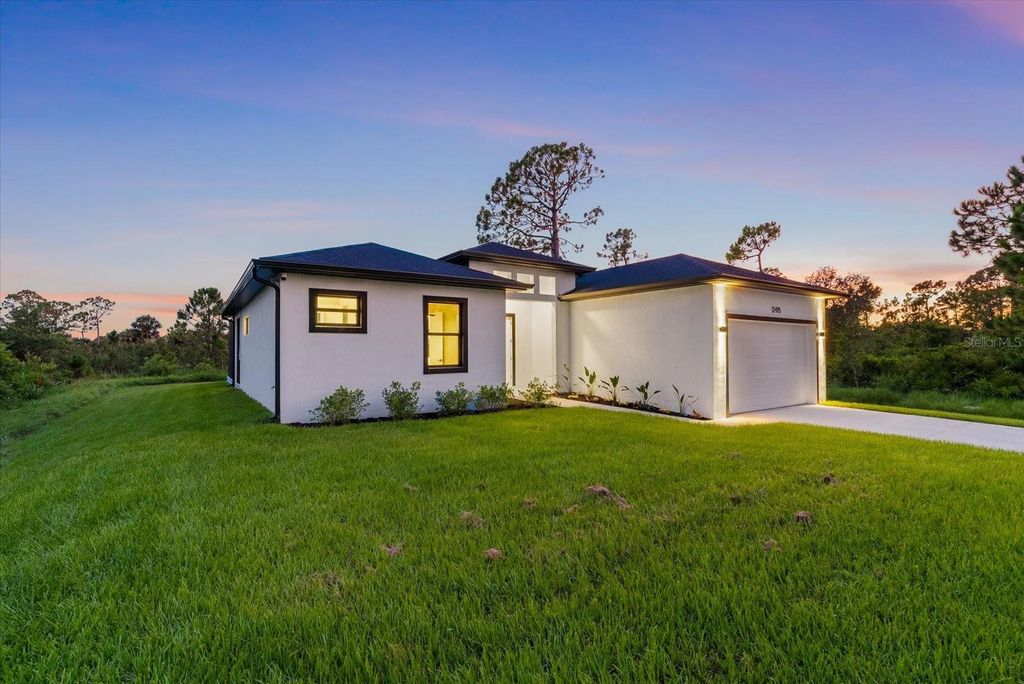 Photo of 12415 Mellon Avenue, Port Charlotte, FL 33953 (MLS # A4661121)