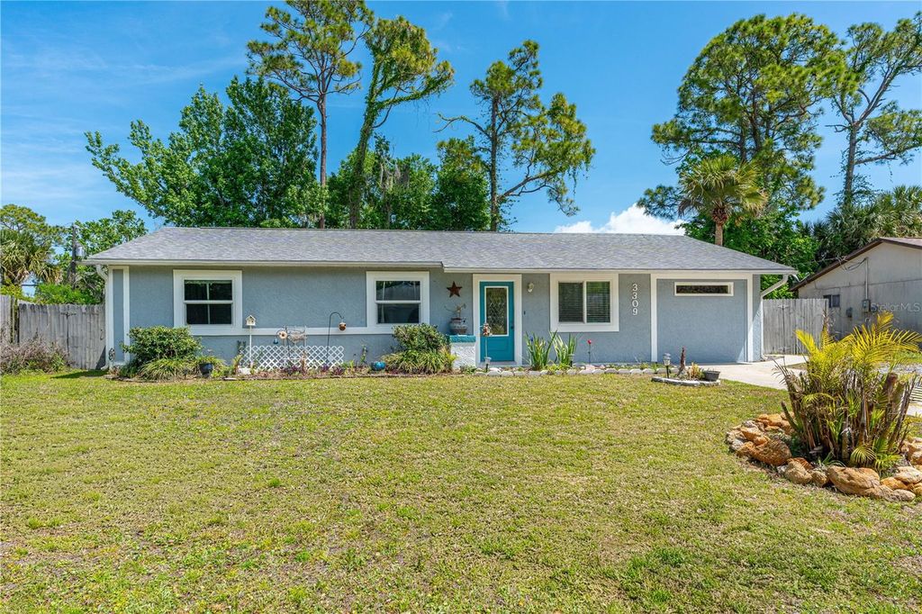 Photo of 3309 Woodland Drive, Edgewater, FL 32141 (MLS # FC317473)
