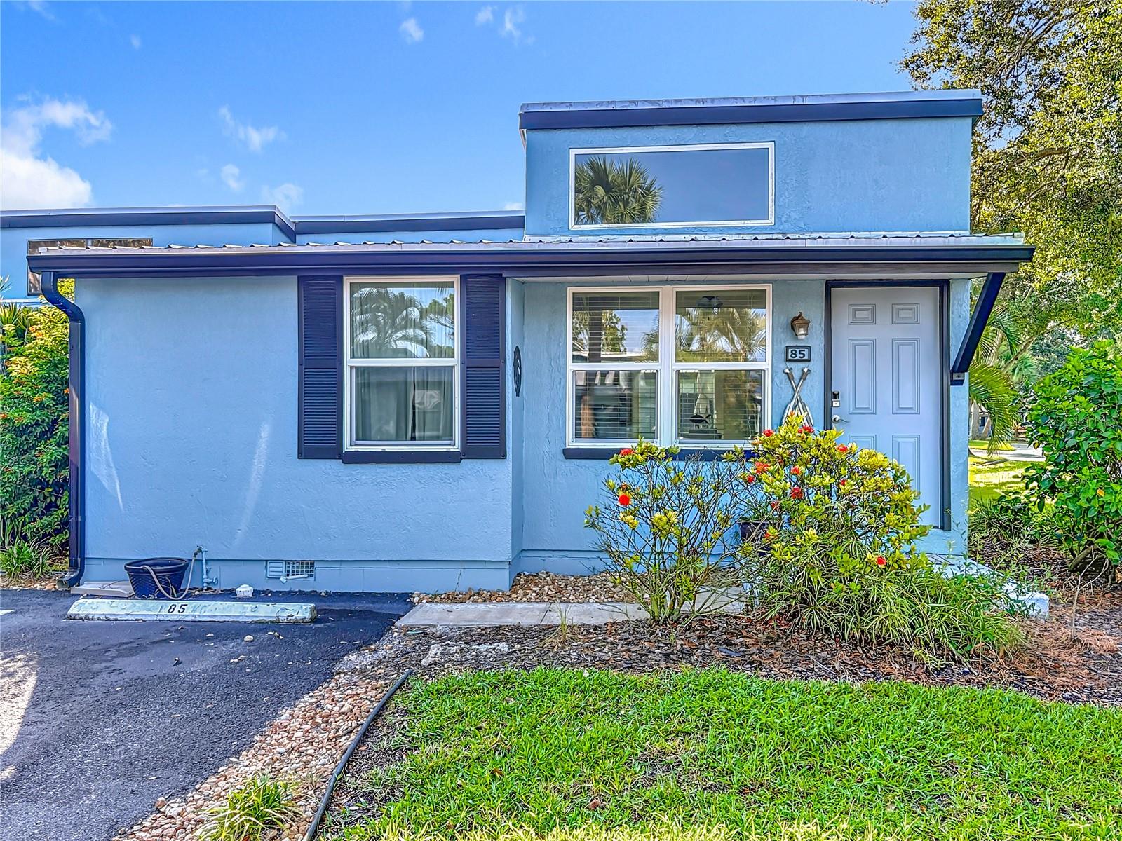 Enjoy the most beautiful sunsets from Dolphin Cove. This charming community offers bike and kayak storage. This particular unit includes a deeded boat slip (#22). Golf carts are allowed and encouraged here in New Smyrna Beach. Re-inforced community seawall revetment was done in 2023.
Enter into the light and bright open concept for easy flow from one room to the other while entertaining , relaxing, or cooking in the kitchen. The kitchen has beautiful high end stone counter with new appliances. New hurricane windows and doors installed 2021, central HVAC, tankless hot water heater, and LVP flooring. Laundry is located inside one of the bathrooms for convenience. Head out back to the patio and relax with a cup of coffee or entertain your loved ones while preparing a meal on the grill. Make this adorable 2/2 your permanent getaway.
Dolphin Cove is located between Canal St and Flagler Ave. New Smyrna Beach, galleries, restaurants, bars, shopping, surf shops are all just a short walk, bike ride or golf cart ride away.