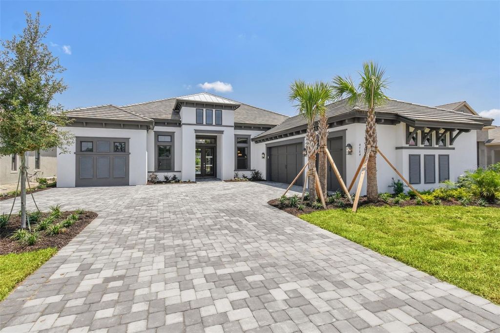 Photo of 4784 FRECCIA LOOP, WESLEY CHAPEL, FL 33543 (MLS # U8205720)