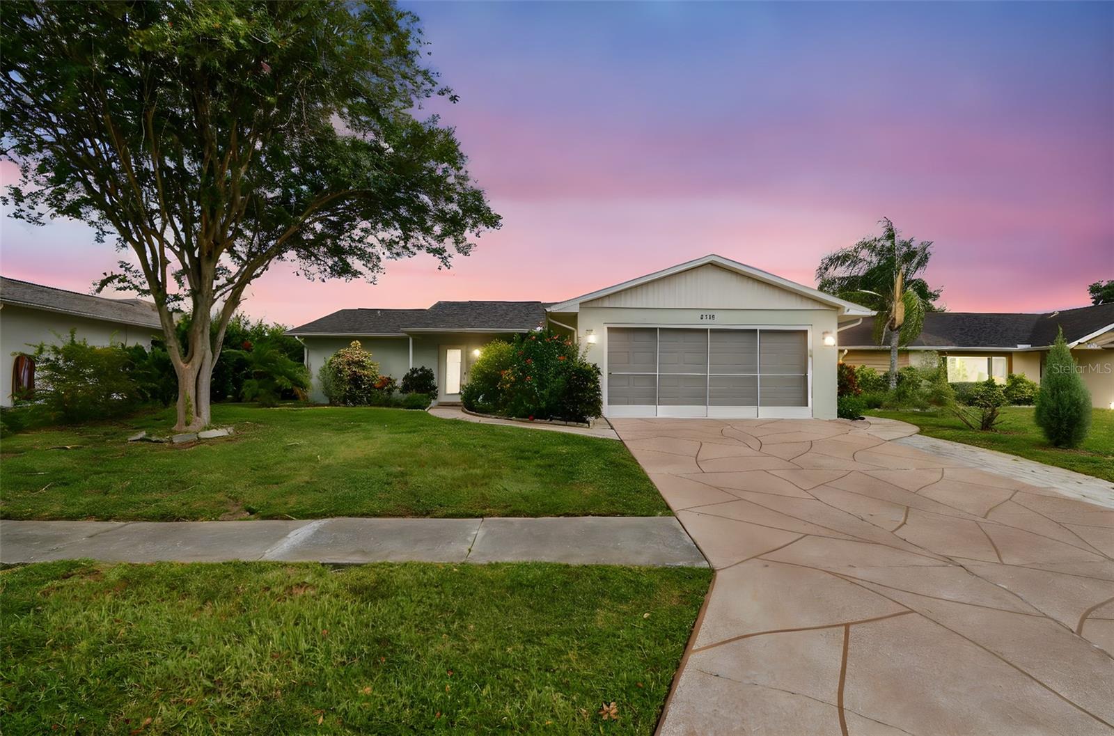 Welcome to this well-maintained, move-in-ready POOL home in Port Richey. Situated 40 minutes northwest of Tampa, FL, this home was built in 1986 and offers 1,240 square feet of living space on a 0.15-acre lot. The floor plan includes two spacious bedrooms and two full baths, zoned for added privacy.
The interior features newer paint, lighting, and luxury vinyl flooring. A number of the Miami-Dade-rated PGT windows and slider have Allied shades or plantation shutters. The kitchen is outfitted with solid wood cabinetry with soft-close drawers, Corian countertops, and newer appliances, creating a functional and refined cooking space. A water softener ensures that you have softer skin and hair and protects your fixtures from corrosion of hard chemical buildup. Both bedrooms have walk-in closets.
Outdoor living is elevated with a screened, in-ground saltwater fiberglass pool, flowering shrubs, a storage shed, and a fully enclosed vinyl-fenced backyard. A new roof was installed in 2021, and between 2023 and 2024, the home received a new well pump, irrigation tank, and a new water heater. The freshly painted two-car garage includes a screened door and a new garage door opener. If you need more storage than the garage offers, there is a shed, complete with hurricane tie-downs. The lush landscaping is fed with irrigation via a well, outfitted with a new pump and tank this year.
Pride of ownership is evident throughout…from the 6-month check-ups on the mechanicals with Farrell Electrical, Plumbing, and HVAC since purchasing in 2021 to the installation of a new salt cell chlorinator, Hayward Navigator (pool cleaner), and a new timer for the pool. Other upgrades during this time include new interior and exterior paint, a new water heater, an LG washer and dryer, an Insinkerator disposal, and a Liftmaster garage door opener.
Located in Pasco County near the Gulf, this property is zoned for area schools and offers convenient access to local amenities, shopping, and coastal recreation. NO HOA or deed restrictions, NO flood insurance required. Don’t miss this home…it’s a great value in a popular neighborhood!