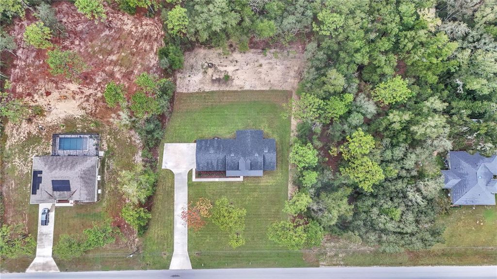 Photo of 8068 SW 129th Terrace Road, Dunnellon, FL 34432 (MLS # O6335859)