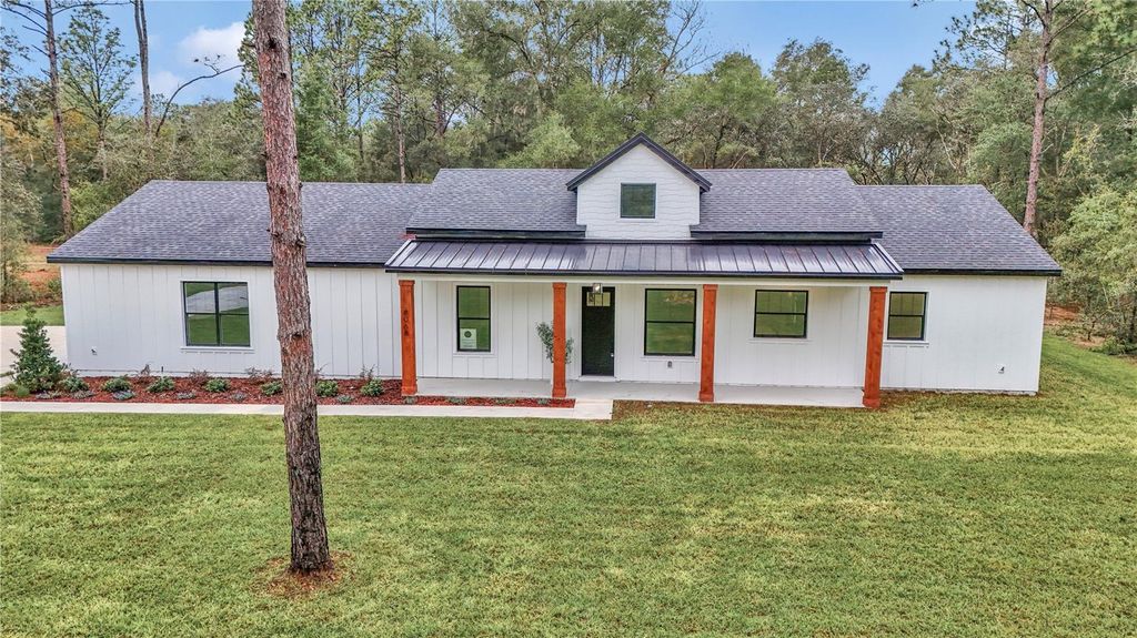 Photo of 8068 SW 129th Terrace Road, Dunnellon, FL 34432 (MLS # O6335859)