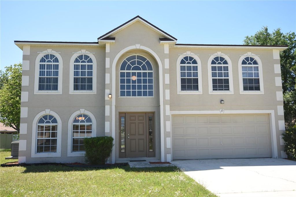 Photo of 37 Buttermill Drive, Palm Coast, FL 32137 (MLS # FC318293)
