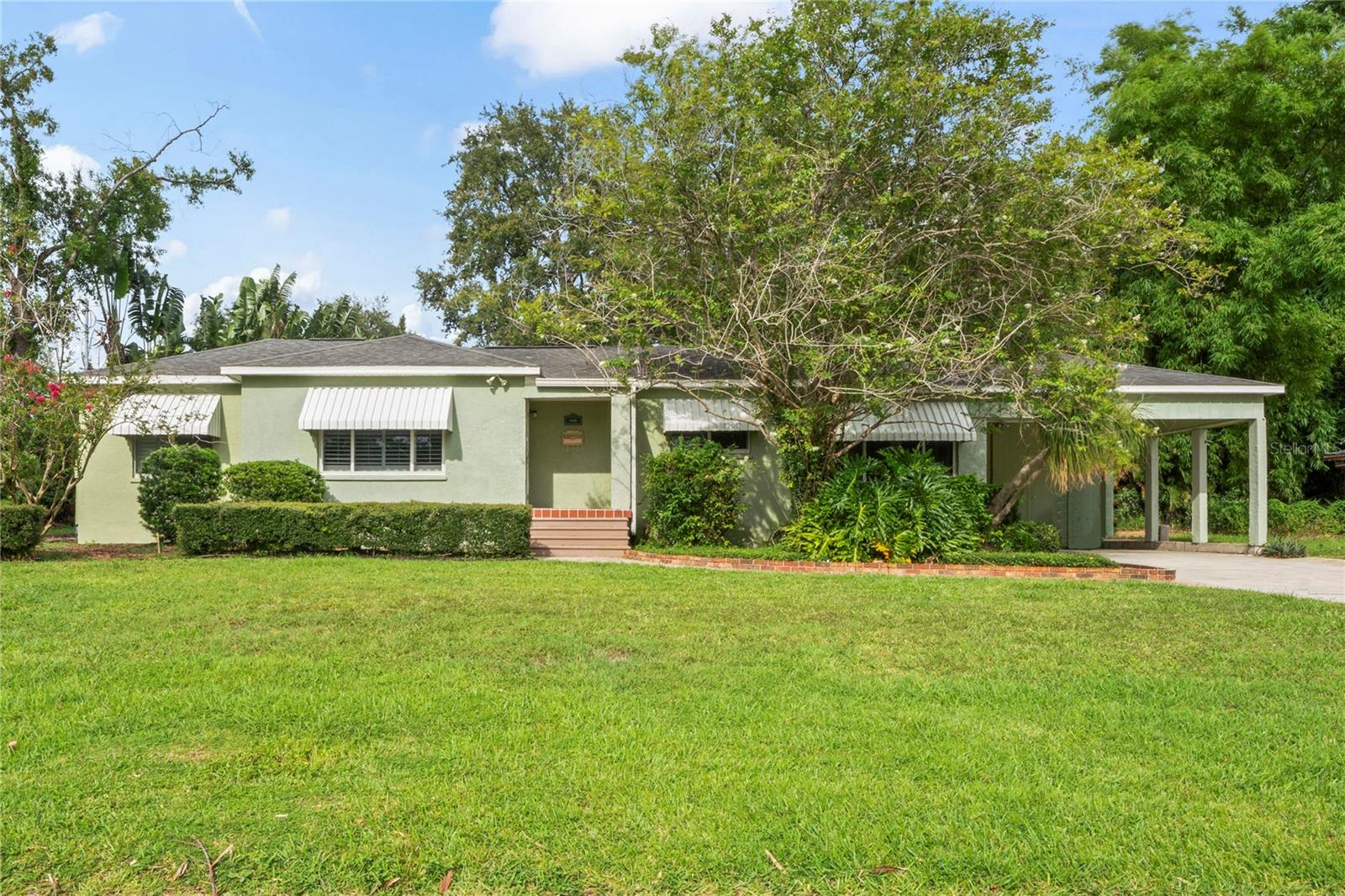 One or more photo(s) has been virtually staged. Beautiful Bungalow on a DOUBLE LOT in highly desirable Northwest Seminole Heights area! This spacious 3-bedroom, 2-bathroom bungalow is situated on a Fenced true double lot, offering future residents, investors or builders a truly unique find. Nestled in a tucked-away location across from million-dollar Riverfront homes, this property promises both privacy and picturesque surroundings. If you are looking for "character" and space in all the right places, the home's well-designed 3-way split floor plan ensures privacy for all; while the open living areas and quaint breakfast room/(office/art studio) with a built-in window storage bench seat, provide ample space to enjoy the natural beauty and tropical oasis scenic backdrops. Whether you choose to relax on the covered patio or enjoy a meal under the enchanting arbor, you'll find plenty of opportunities to appreciate the outdoor nature. The gleaming original wood floors, french doors, and clawfoot bathtub captures the nostalgia of the wonder years. With so many options available, this home caters to various needs. Nearly 800 SF of additional heated/conditioned space could be added under existing roof to accommodate a growing family or create an even more fantastic investment. The enclosed laundry/utility room, large backyard shed, and carport storage closet offers tons of storage space & the owner is leaving the Washer & Dryer for new owners, making this home even more appealing. There's no need to worry about water damage from the 2024 hurricanes, as this property has remained unaffected. Plus, it is NOT located in a flood zone! Property Info & Updates: 2022 HVAC, Windows, Electric Panel, Plumbing, 2025 carpet in Florida Rm, Exterior Paint, Irrigation system on separate well, Plantation Shutters, Kitchen Cabinets, Island w/ Granite Counters, SS Appliances, 2012 Roof, Closet Pantry and under sink water filtration. The front and fenced backyard space are perfect for kids and pets to play and the grill master, gardener, and craftsman to get inspired.
With it's Historic Charm & Architecture, the Seminole Heights area offers a rich history reflected in its beautifully restored 1900's bungalows, Craftsman-style homes, parks, and tree-lined streets attracting a variety of restaurants, cafes, breweries, bars, independent boutiques, vintage shops, live entertainment. Residents also love the popular Sunday Morning Market & thriving community spirit. At its core, Seminole Heights delivers a distinctive lifestyle that combines historic charm, a vibrant local culture, a close-knit outdoor pet friendly community spirit with easy access to many parks & Tampa’s top attractions as it's convenient to Downtown, Ybor City, The Tampa Riverwalk, major thoroughfares, TIA, world renowned hospitals, Moffitt, Lowry Zoo, Busch Gardens, Florida Aquarium, Museums, Theaters, Performing Arts, (Tampa Bay Bucs, Lightning, Rays, & Rowdies) & Concert Venues and still conveniently located to world renowned beaches, fishing, diving, scalloping, & watersports! Boater's and animal lovers are less than 1 mile to Lowry Park Zoo & Boat ramp!