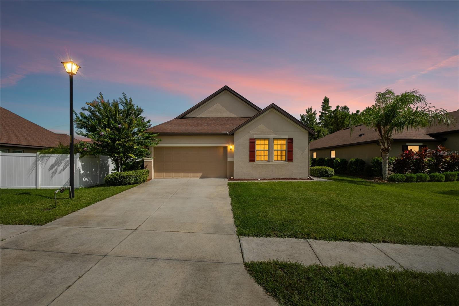 Welcome to 100 San Mardeen Street, nestled in the beautifully crafted community of Tuscany Woods — where nature, comfort, and convenience come together. Surrounded by mature trees and peaceful, picturesque vibes, this neighborhood offers a tranquil escape while keeping you close to everything Daytona Beach is known for.
The home itself is a standout: featuring tall ceilings, luxury vinyl plank flooring, and a bright, open-concept design. The kitchen is a chef’s dream, with granite countertops, a massive island, double ovens, cooktop, pendant lighting, and custom cabinetry in the pantry, laundry room, and primary suite closet. The primary bedroom also features a tray ceiling and private en-suite bath, thoughtfully separated from the rest of the home.
Upstairs, a spacious loft with its own full bath creates the perfect guest suite, studio, or even a media/movie room. Downstairs offers a dedicated flex room ideal for a home office or cozy den.
Step outside to enjoy your fully fenced backyard with a covered patio, offering both privacy and style. And just down the street, Tuscany Woods residents enjoy a community pool, playground, and walking paths, all surrounded by Florida’s natural beauty.
Located just minutes from the Daytona International Speedway, Daytona Beach Pier, shopping, dining, and major roadways, this home gives you the best of both worlds: a peaceful retreat with high-energy convenience just around the corner.