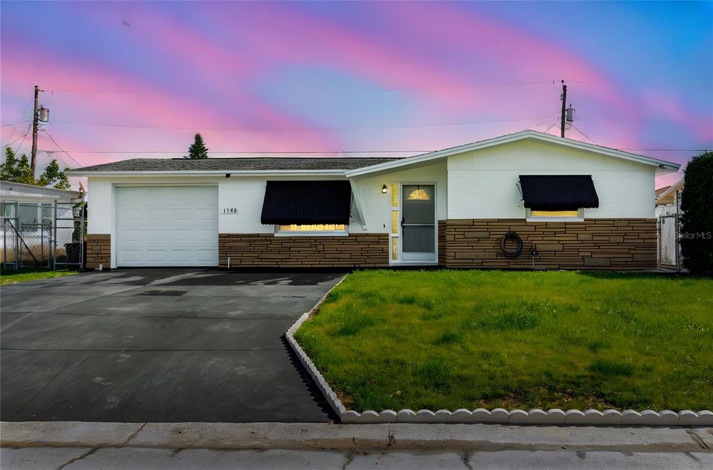 Photo of 1548 Landau Street, Holiday, FL 34690 (MLS # TB8468481)