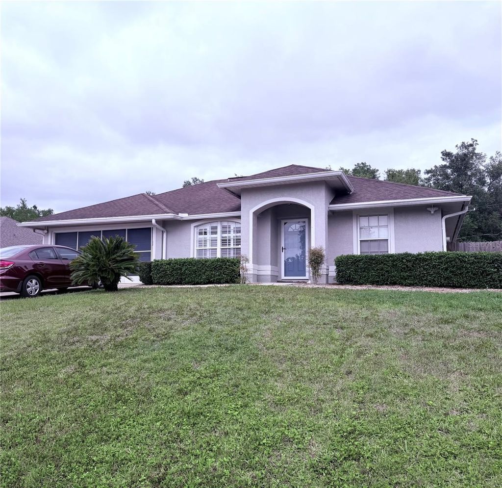 Photo of 2177 E Gloria Dr, Deltona, FL 32725 (MLS # V4948369)