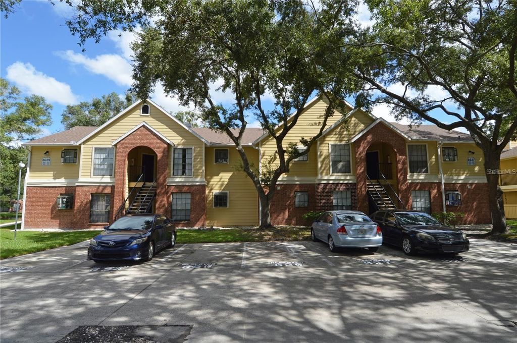 Photo of 8629 Fancy Finch Drive #102, Tampa, FL 33614 (MLS # TB8467622)