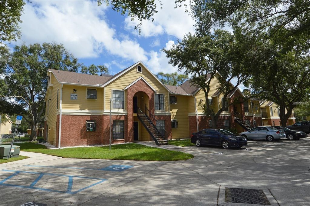 Photo of 8629 Fancy Finch Drive #102, Tampa, FL 33614 (MLS # TB8467622)