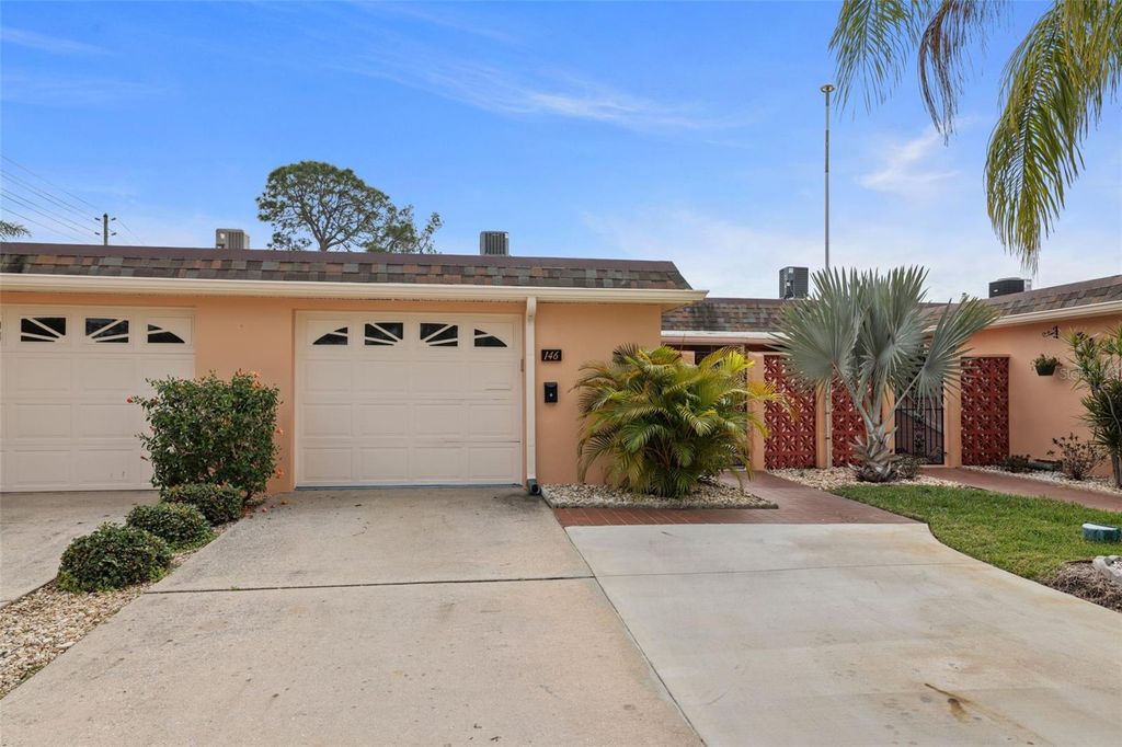 Photo of 146 Boca Ciega Point Blvd Boulevard S #146, St Petersburg, FL 33708 (MLS # TB8458598)