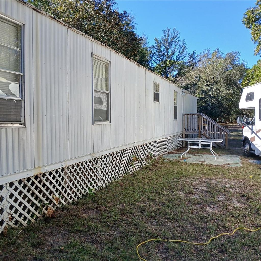 Photo of 7050 S Sonata Avenue, Homosassa, FL 34446 (MLS # OM715017)