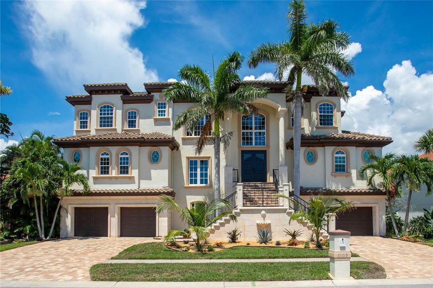 One or more photo(s) has been virtually staged. NOW THIS IS A STUNNING CUSTOM-BUILT WATERFRONT HOME and sits high and dry. This home is almost 6000 square feet heated and 11000 in total under roof. Boasting 6 bedrooms, a game room/bonus room, elevator, state of the art chef's kitchen with designer appliances office, 7 CAR GARAGE and 91 feet of protected water overlooking the Pasadena Yacht and Country Club Golf Course. This block home is a must see with newer windows and roof. 
  Located inside the GATED community offers a lifestyle rarely found in Pinellas County complete with a protected deep-water marina with easy access to Gulf, award winning 18-hole golf course, tennis courts, pickle ball courts, club house, restaurants and community pool. Purchase a property within the gates and jump the multiple year waitlist to become a member of this incredible Golf and Yachting community.