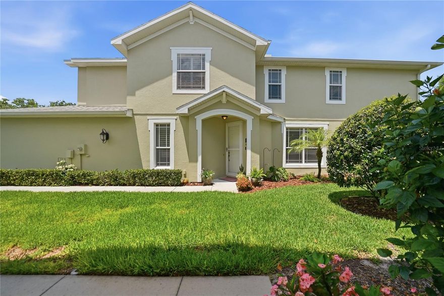 This beautifully maintained corner townhome combines abundant natural light, thoughtful upgrades, and peaceful waterfront views in one of Palm Harbor’s most desirable locations. A private side entrance with an impressive 9-foot entry door creates a welcoming first impression.
Inside, the open-concept floor plan features 10-foot ceilings, crown molding, plantation shutters, tile flooring throughout the main level, a half bath, and a dramatic 14-foot wall of pocketing triple sliding glass doors that seamlessly connect the living space to the screened lanai patio overlooking the pond. Mature cypress trees provide shade and privacy, creating a serene outdoor setting.The kitchen is both stylish and functional, featuring solid wood cabinetry, granite countertops, a closet pantry, and stainless-steel appliances. There’s also flexible space for a breakfast table, coffee station, or additional storage. Upstairs, vaulted ceilings and rich luxury vinyl flooring elevate the living space. The spacious primary suite offers tranquil water views, an oversized walk-in closet, a newly remodeled en-suite bath with a walk-in shower. Two additional generously sized bedrooms share a full bath with tub/shower combination. A centrally located laundry closet includes a newer washer and dryer plus extra shelving for convenience.
The oversized two-car garage with finished floors offers extra room for storage, shelving, or a secondary freezer and includes a separate utility closet. 
Located in a well-maintained community with low HOA fees, residents enjoy water, sewer, trash, recycling, high-speed internet, expanded cable, landscaping, irrigation, exterior maintenance, roof replacement, and access to the community pool and cabana. The community is pet-friendly and allows two pets with no size restrictions. Flood insurance is not required, and the home experienced no flooding or power loss during Hurricanes Helene or Milton. Ideally situated just minutes from historic Tarpon Springs and Dunedin, this home offers easy access to award-winning beaches, golf courses, parks, shopping, dining, and the Pinellas Trail just across the street. The nearby Jolley Trolley provides convenient transportation throughout the area year-round. Recently ranked the #2 Best Place to Live in Florida for 2025 and 2026 by U.S. News & World Report, Palm Harbor is known for its highly rated schools, coastal lifestyle, parks, and strong sense of community.
Schedule your private showing today and experience everything this exceptional home has to offer.
Highlights: Impact/Hurricane rated windows, sliders, and doors. New roof scheduled by the HOA/association in 2027. Non-Flood Zone. Soft water system and water filteration system installed in home.