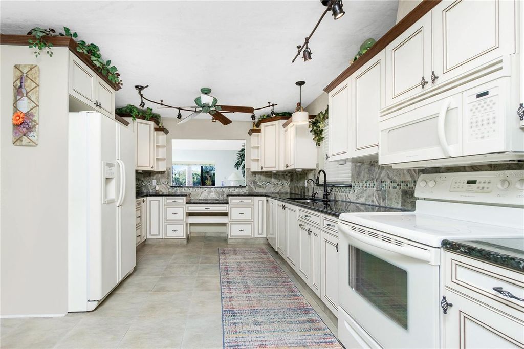 Photo of 11409 SW Courtney Drive, Lake Suzy, FL 34269 (MLS # C7522155)