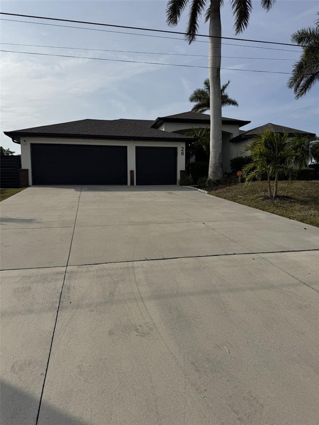 Photo of 26 NW 8th Pl, Cape Coral, FL 33993 (MLS # N6143763)