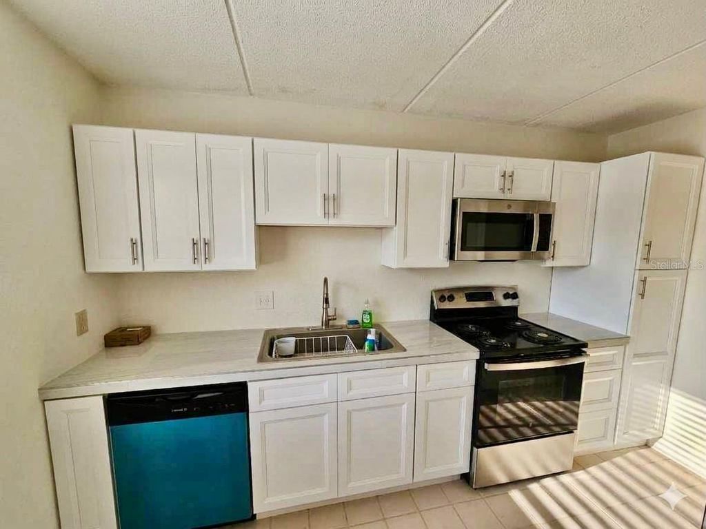 Photo of 4435 1st Street NE #103, St Petersburg, FL 33703 (MLS # TB8492162)