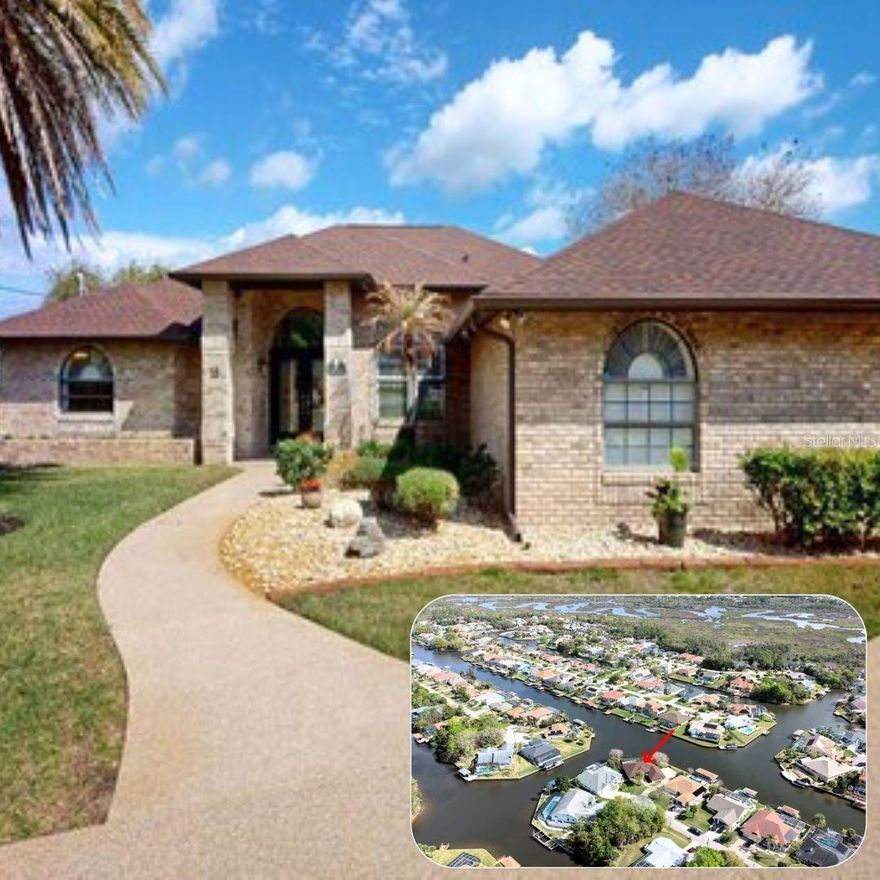 Welcome to 16 Crandell Ct in Palm Coast’s desirable C location, where solid construction, thoughtful upgrades, and true waterfront living come together. This beautiful brick 3-bedroom, 3-bath canal pool home offers durability, comfort, and a lifestyle designed around the water.

Recent improvements provide peace of mind, including a new roof (March 2026), new HVAC system (2025), new gutters (2026), and a freshly sealed seawall (September 2025). The property also features all new electrical boxes and electrical updates throughout.

A private electronic driveway gate welcomes you into the property where a sealed driveway with warranty leads to an oversized turnaround area overlooking the canal. The home’s brick exterior and well-maintained landscaping with decorative stonework and lighting create inviting curb appeal both day and evening.

Inside, large windows bring in natural light and frame peaceful canal views from the main living and dining areas. The layout offers three full bedrooms, including a secondary bedroom that can function as a second primary suite, making the home ideal for guests or multi-generational living.

Step outside to the screened pool enclosure overlooking the canal, perfect for relaxing or entertaining. The spacious covered brick lanai features skylights, ceiling fans, and a built-in serving/grilling area, creating a comfortable outdoor living space year-round.

Wake up to beautiful sunrises over the water, and many evenings you may even see dolphins playing in the canal, bringing nature right to your backyard.

Located near Palm Coast’s extensive trail system, parks, and waterways, outdoor recreation is always close by—whether biking scenic trails, kayaking nearby canals, or boating from your backyard.

Waterfront living, privacy, and solid brick construction make this a rare opportunity—come drop anchor at 16 Crandell Ct.