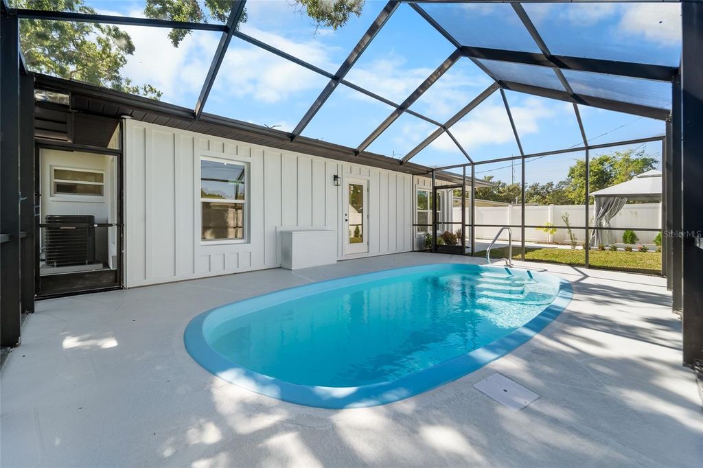 Photo of 1559 78th Terrace N, St Petersburg, FL 33702 (MLS # TB8440691)